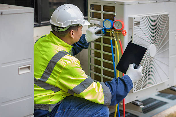 Professional Heat Pump Repair technician working in Heisson, WA